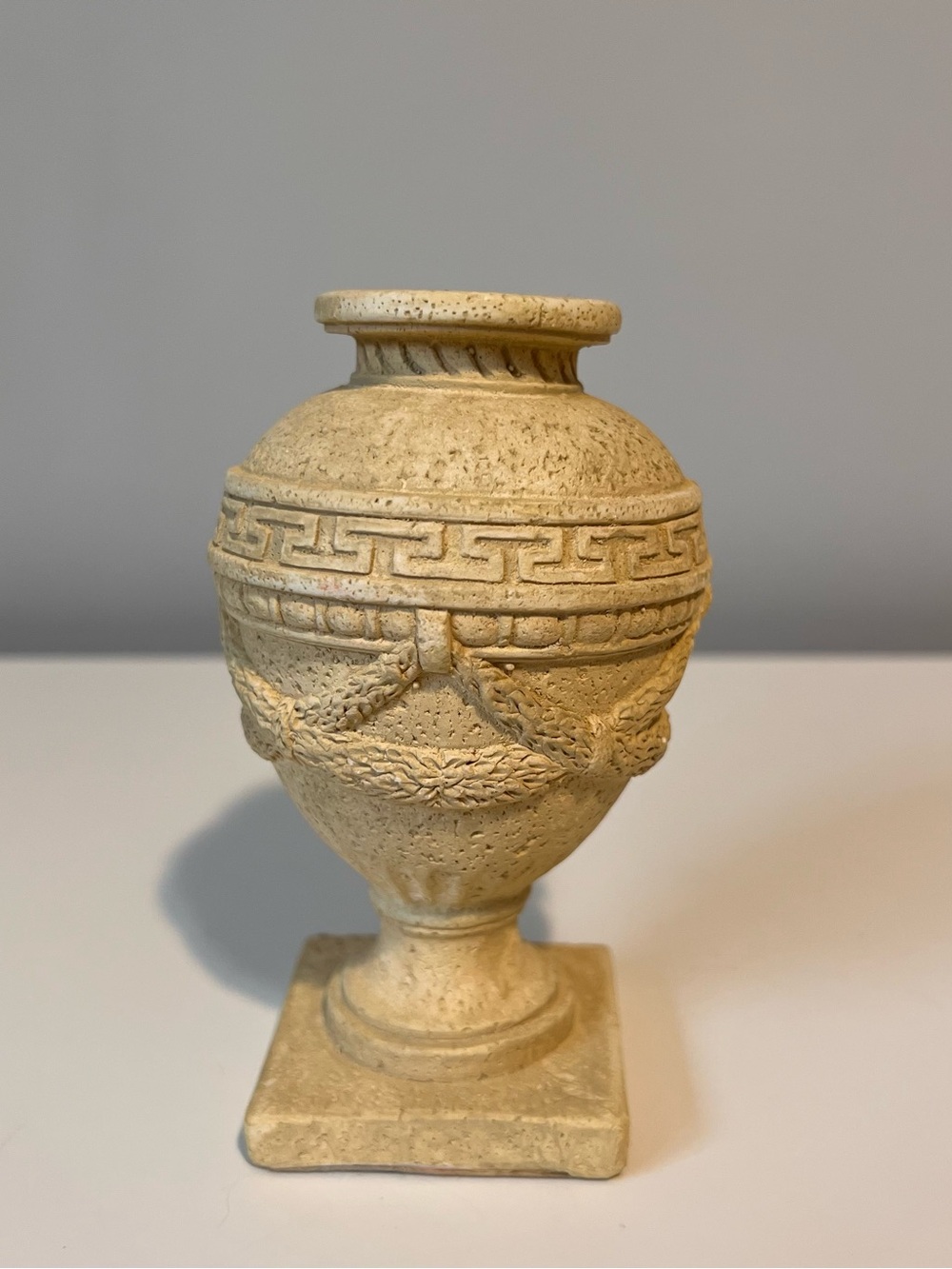 Elegant Cream Decorative Urn Sculpture by